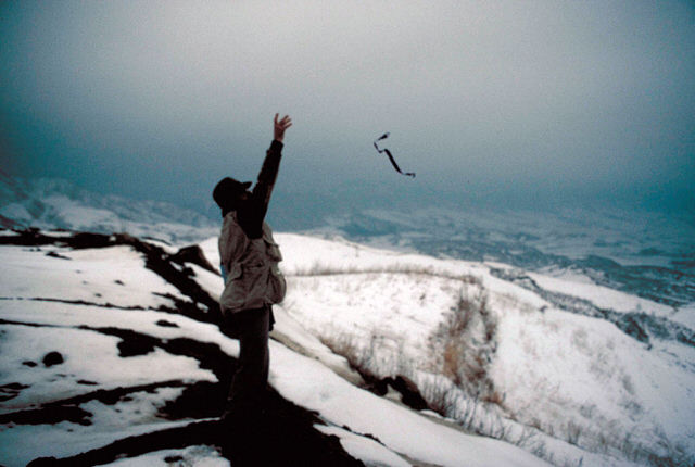 Photo by Ministry of Defense, Republic of Korea. Hal Barker releasing the ribbon from the Sunset High diploma of Sergeant Charles F. Lehman of Oak Cliff, Dallas, Texas. KIA Punchbowl, September 1951.